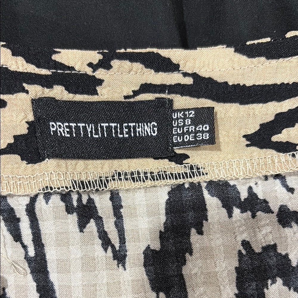 PrettyLittleThing Black and Tan Patterned romper